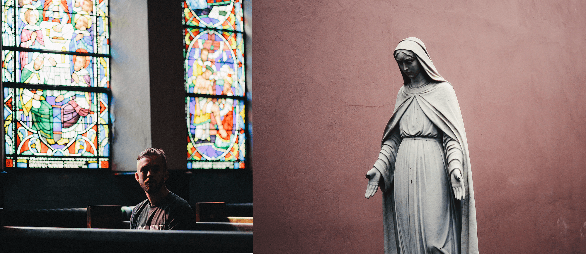 Man praying next to a statue of Mary 