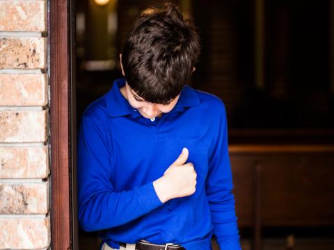 Picture of a boy in a blue shirt