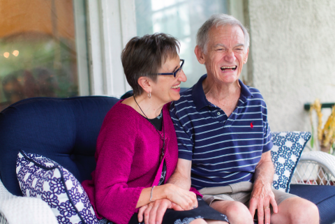 Martin laughing with her husband Jan